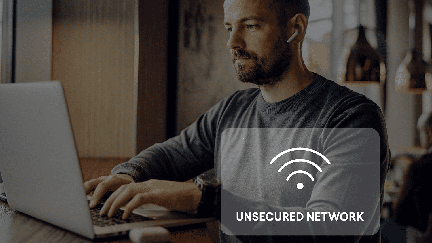 Man connecting to unsecured Wi-Fi in a public space
